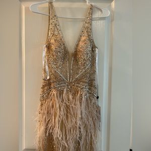 Jovani Nude Sheer Beaded Gown